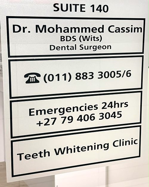 Door sign reading Suite 140, Dr Mohammed Cassim BDS (Wits), Dental Surgeon